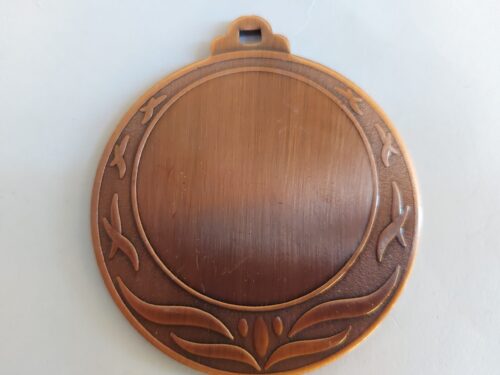 Medalla Ref. 1036 Color Cobre  (Existencias 11 ) Se venden las 11 juntas.*
